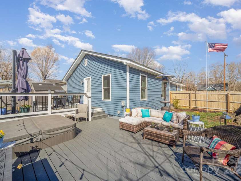 1016 10th Street, Kannapolis, NC 28083.  MLS# CAR4228816, YatesRealty ID 8864. Lower deck with hot tub.