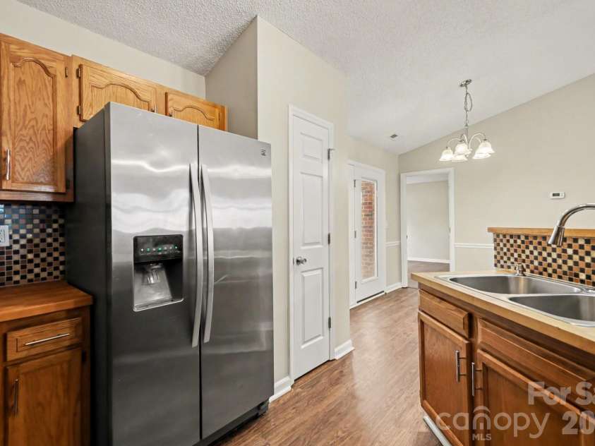 1117 Capps Hollow Drive, Charlotte, NC 28216.  MLS# CAR4361982, YatesRealty ID 8864. 
