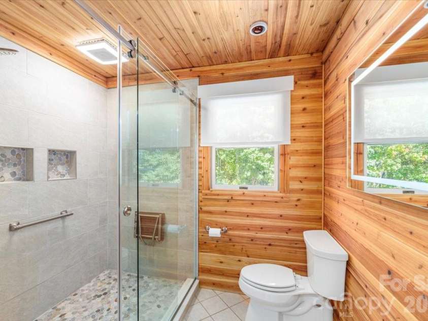 295 Laurel Ridge Drive, Waynesville, NC 28786.  MLS# CAR4312458, YatesRealty ID 8868. Cedar lined shower area - Primary