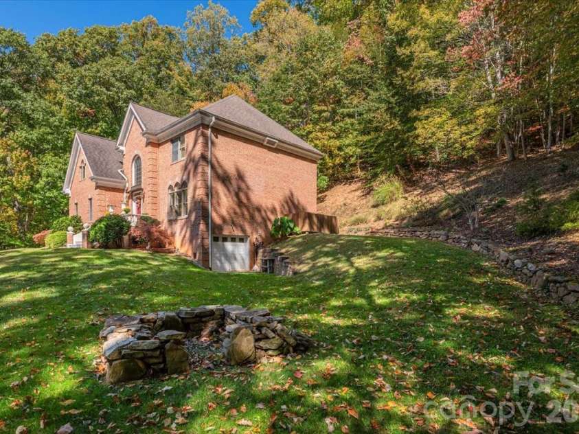 295 Laurel Ridge Drive, Waynesville, NC 28786.  MLS# CAR4312458, YatesRealty ID 8868. Firepit