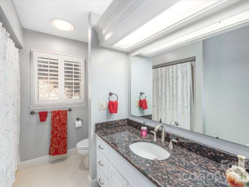 295 Laurel Ridge Drive, Waynesville, NC 28786.  MLS# CAR4312458, YatesRealty ID 8868. Guest Bath