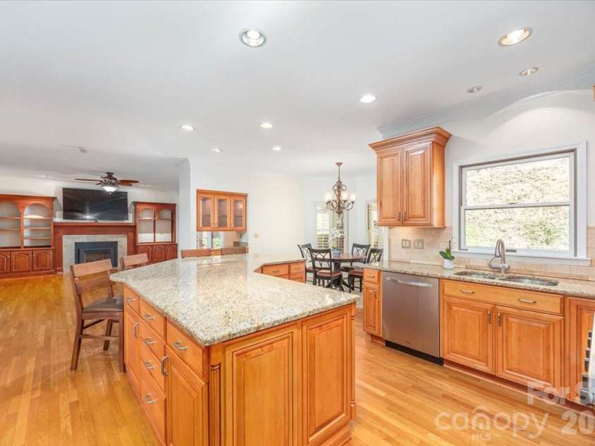 295 Laurel Ridge Drive, Waynesville, NC 28786.  MLS# CAR4312458, YatesRealty ID 8868. Kitchen Island with more storage & seating