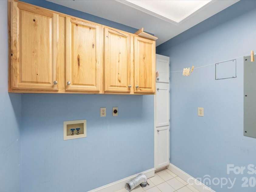 295 Laurel Ridge Drive, Waynesville, NC 28786.  MLS# CAR4312458, YatesRealty ID 8868. Laundry Room with Hookup/Ironing Board