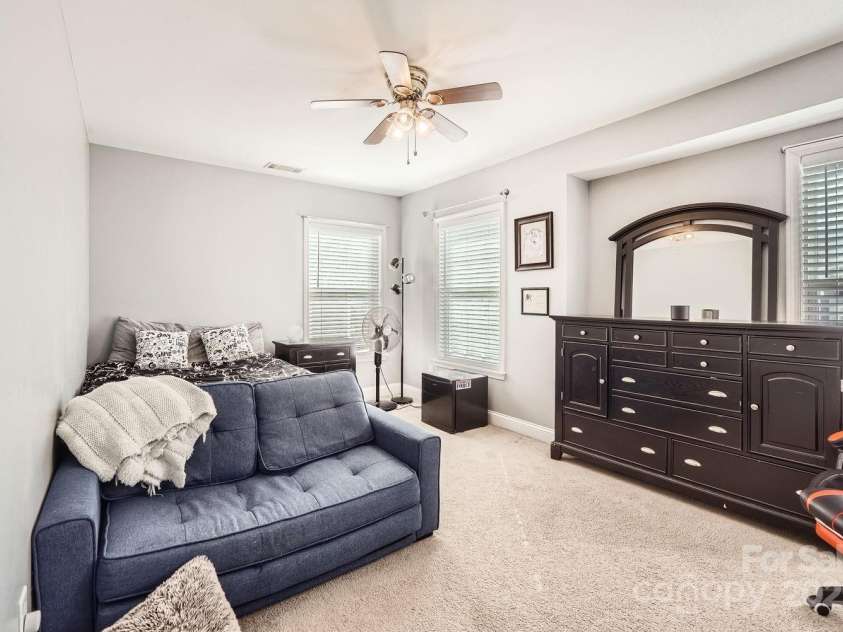 141 Silverspring Place, Mooresville, NC 28117.  MLS# CAR4218653, YatesRealty ID 8869. 2nd Bedroom...Roomy and Bright!