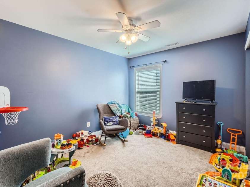 141 Silverspring Place, Mooresville, NC 28117.  MLS# CAR4218653, YatesRealty ID 8869. 4th Bedroom...now being used as a toy room. Great space!