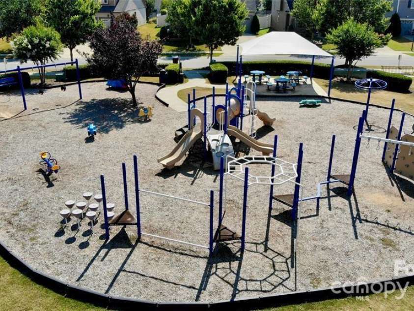 141 Silverspring Place, Mooresville, NC 28117.  MLS# CAR4218653, YatesRealty ID 8869. Great playground area in your community!