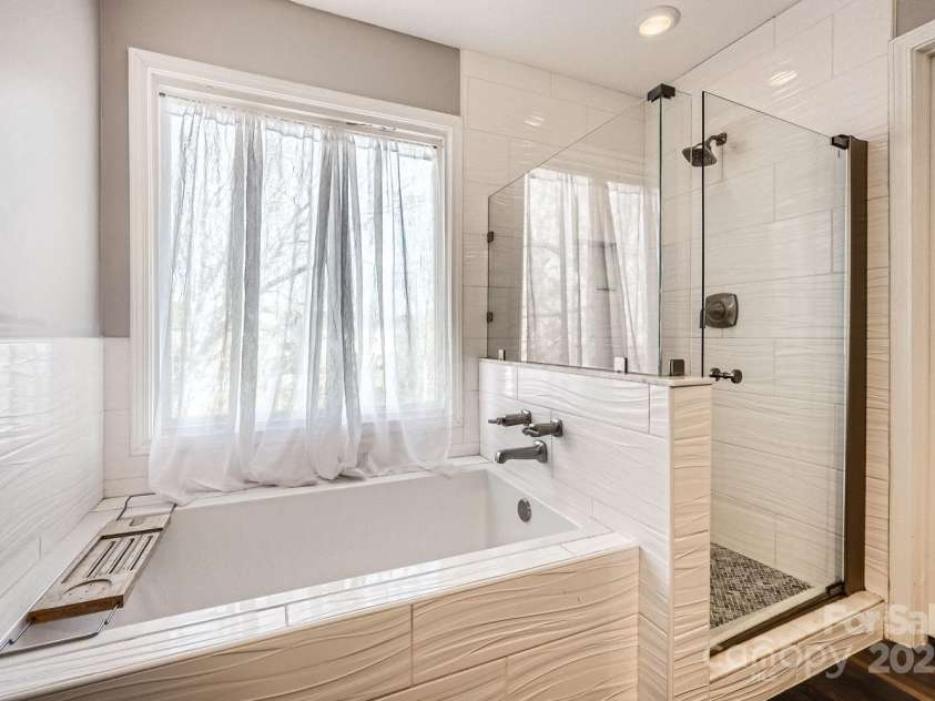 141 Silverspring Place, Mooresville, NC 28117.  MLS# CAR4218653, YatesRealty ID 8869. Look at your Primary spa area!