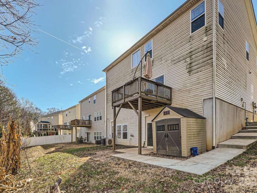 141 Silverspring Place, Mooresville, NC 28117.  MLS# CAR4218653, YatesRealty ID 8869. Relax outdoors in your backyard on your patio. Grab what you need from the shed.