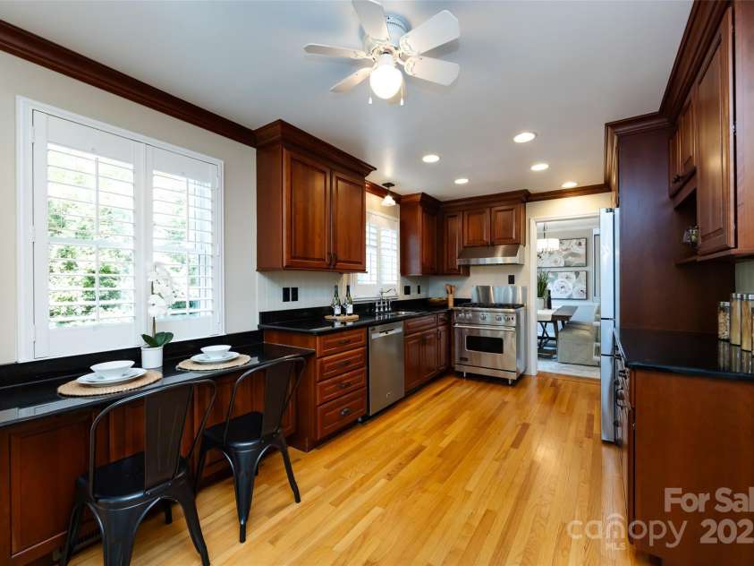 757 Concord Road, Davidson, NC 28036.  MLS# CAR4265019, YatesRealty ID 8872. Bar seating area at the window in the Kitchen