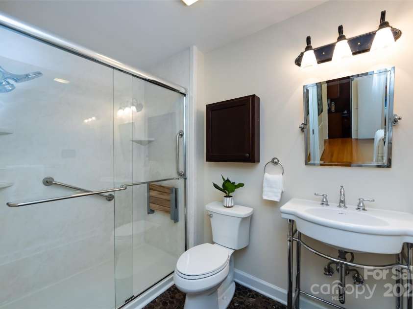 757 Concord Road, Davidson, NC 28036.  MLS# CAR4265019, YatesRealty ID 8872. Full bathroom on the main level with large, walk-in shower