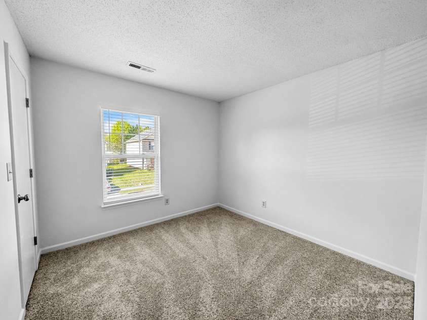 8829 Michaw Court, Charlotte, NC 28269.  MLS# CAR4246491, YatesRealty ID 8872. 2nd bedroom