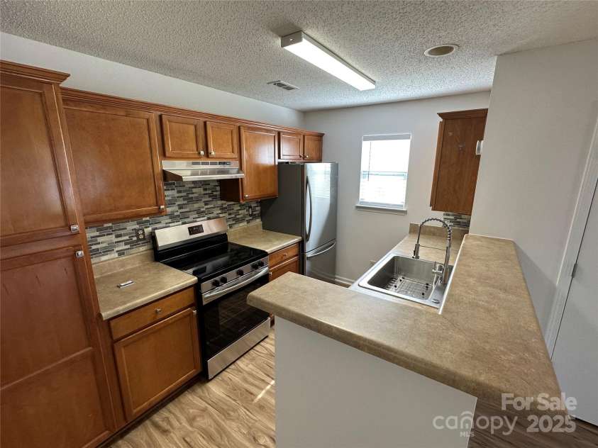 8829 Michaw Court, Charlotte, NC 28269.  MLS# CAR4246491, YatesRealty ID 8872. 