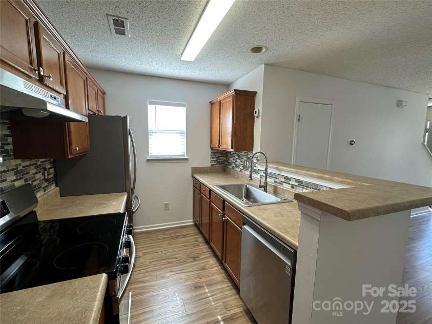 8829 Michaw Court, Charlotte, NC 28269.  MLS# CAR4246491, YatesRealty ID 8872. 