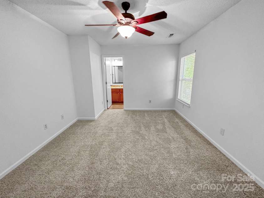 8829 Michaw Court, Charlotte, NC 28269.  MLS# CAR4246491, YatesRealty ID 8872. Primary bedroom