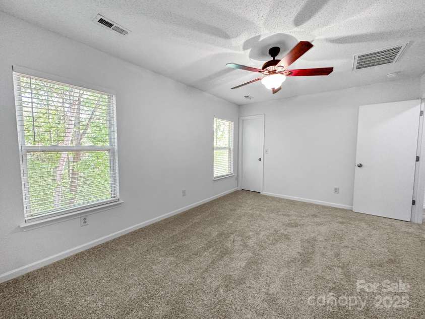 8829 Michaw Court, Charlotte, NC 28269.  MLS# CAR4246491, YatesRealty ID 8872. Primary bedroom