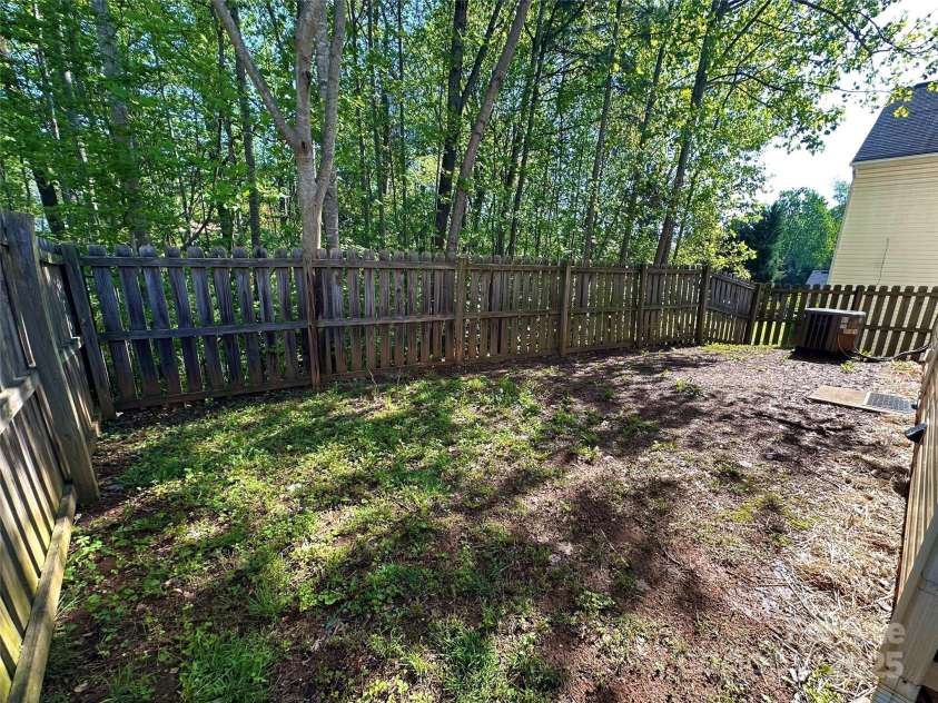 8829 Michaw Court, Charlotte, NC 28269.  MLS# CAR4246491, YatesRealty ID 8872. Small privacy-fenced backyard