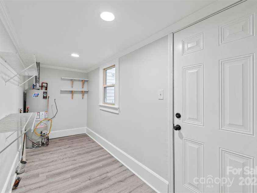 63 3rd Street, Concord, NC 28027.  MLS# CAR4220765, YatesRealty ID 8874. Laundry room