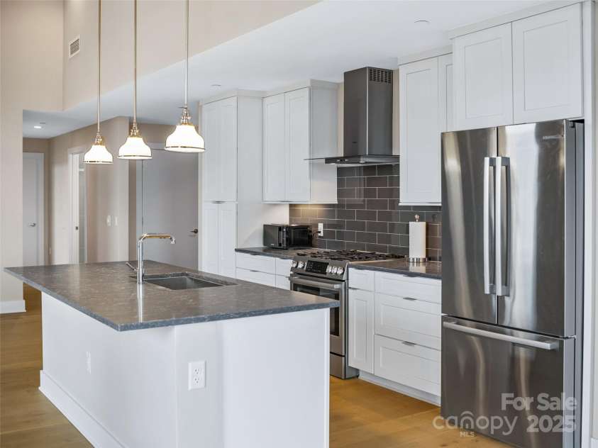 145 Biltmore Avenue, Asheville, NC 28801.  MLS# CAR4331069, YatesRealty ID 8878. Beautiful quartz countertops