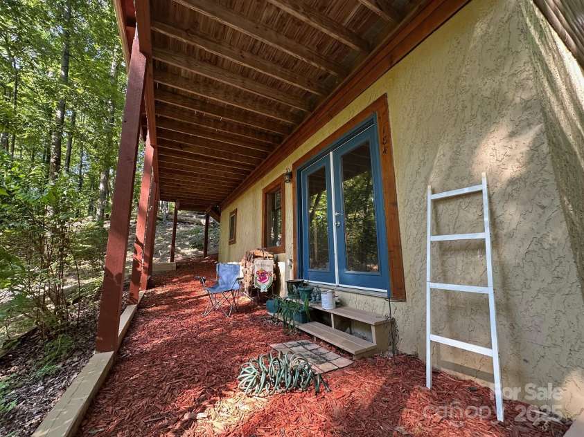 184 Poplar Drive, Lake Lure, NC 28746.  MLS# CAR4285241, YatesRealty ID 888. Basement level, exterior