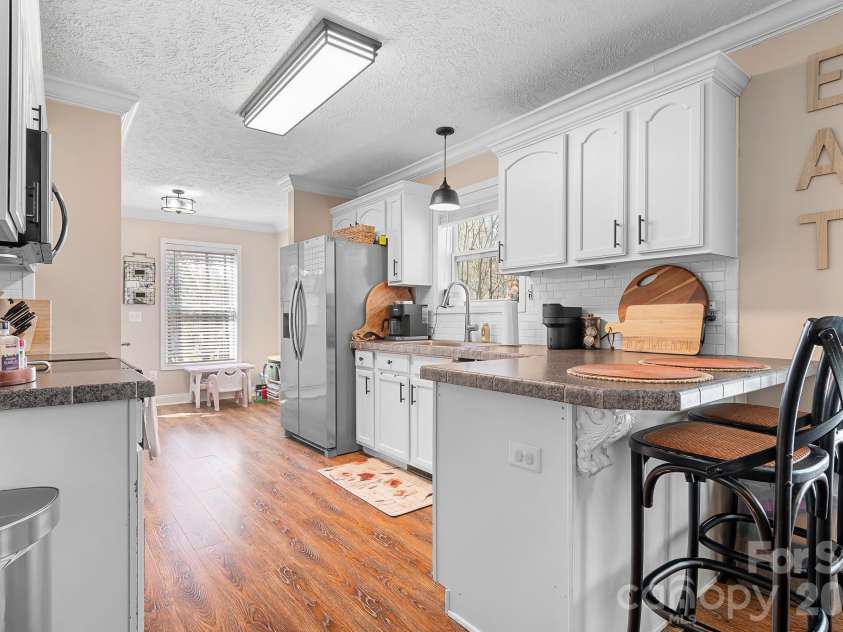5912 Rocky River Road, Monroe, NC 28112.  MLS# CAR4359038, YatesRealty ID 8881. 