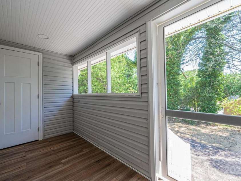 1143 College Avenue, Newton, NC 28658.  MLS# CAR4245448, YatesRealty ID 8885. Back porch