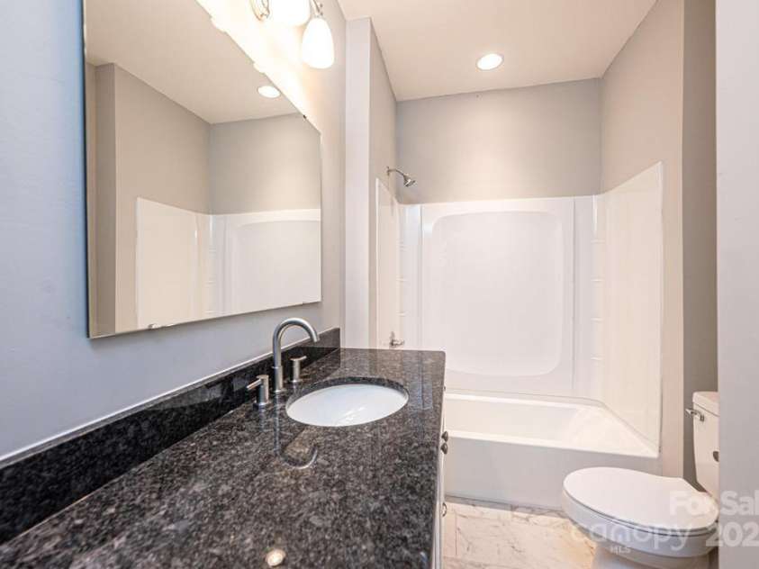 1143 College Avenue, Newton, NC 28658.  MLS# CAR4245448, YatesRealty ID 8885. Hall bath