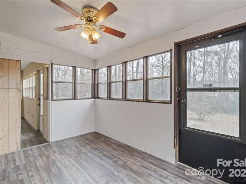 122 Lowry Row, York, SC 29745.  MLS# CAR4214035, YatesRealty ID 8886. This room is off of the den area - alot of windows - a storm door leading out to the back of the house