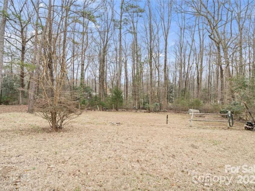 122 Lowry Row, York, SC 29745.  MLS# CAR4214035, YatesRealty ID 8886. You will love the size of this backyard - includes a shed for storage