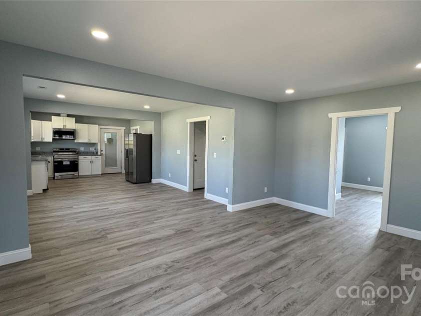 702 Grover Street, Shelby, NC 28150.  MLS# CAR4237734, YatesRealty ID 8888. LR/ Primary Bedroom off to right