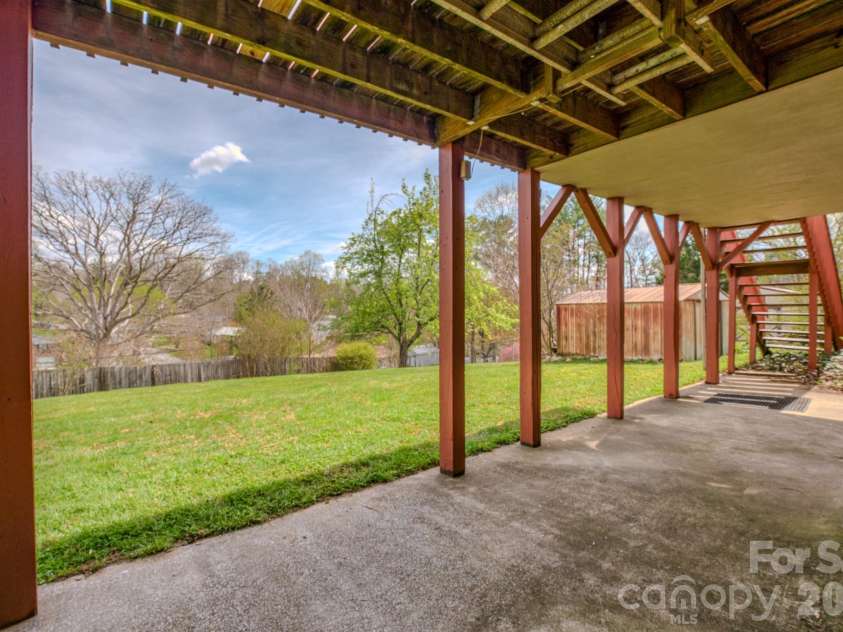 8 Summit Drive, Arden, NC 28704.  MLS# CAR4360548, YatesRealty ID 8889. Backyard