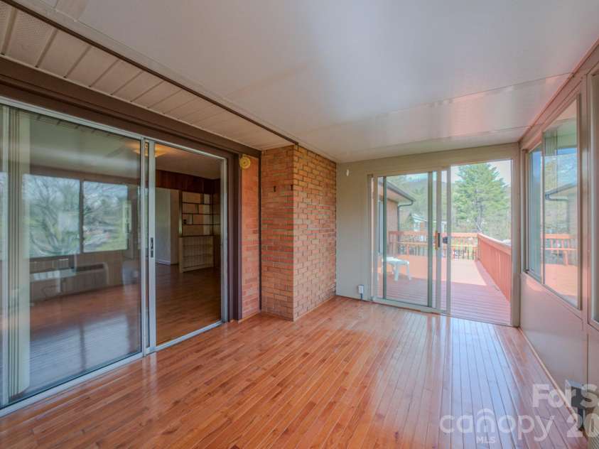 8 Summit Drive, Arden, NC 28704.  MLS# CAR4360548, YatesRealty ID 8889. Sunroom 