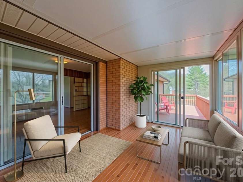 8 Summit Drive, Arden, NC 28704.  MLS# CAR4360548, YatesRealty ID 8889. Virtually Staged Sunroom