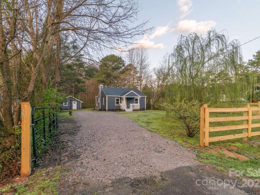 6282 Richburg Road, Great Falls, SC 29055.  MLS# CAR4235952, YatesRealty ID 8890. Gated driveway entry