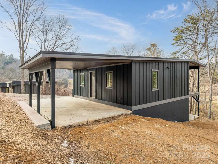 20 Cane Creek Lane, Fairview, NC 28730.  MLS# CAR4216687, YatesRealty ID 8892. Generous Carport for Ease of Access