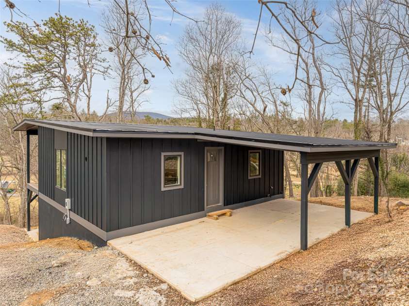 20 Cane Creek Lane, Fairview, NC 28730.  MLS# CAR4216687, YatesRealty ID 8892. Modern Mountain Cabin Fairview