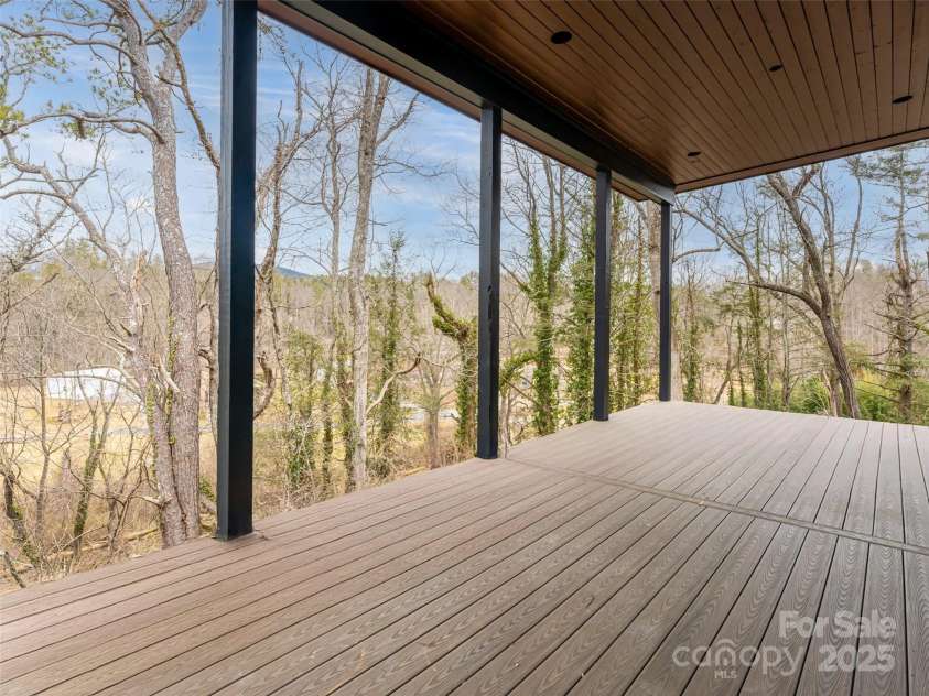 20 Cane Creek Lane, Fairview, NC 28730.  MLS# CAR4216687, YatesRealty ID 8892. Upper Level Deck With Countryside Views