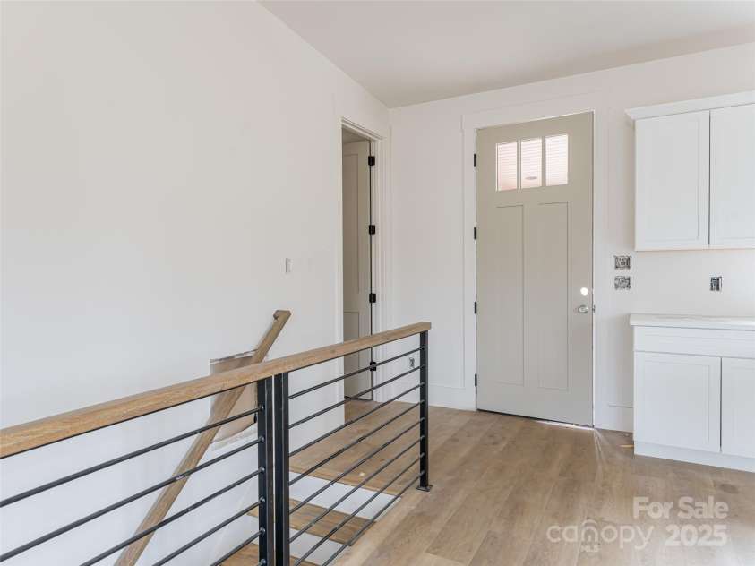 20 Cane Creek Lane, Fairview, NC 28730.  MLS# CAR4216687, YatesRealty ID 8892. Welcoming Entrance Flows into the Open Spaces