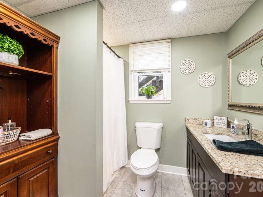 110 Windsor Street, Connelly Springs, NC 28612.  MLS# CAR4351181, YatesRealty ID 8893. Lower level bath