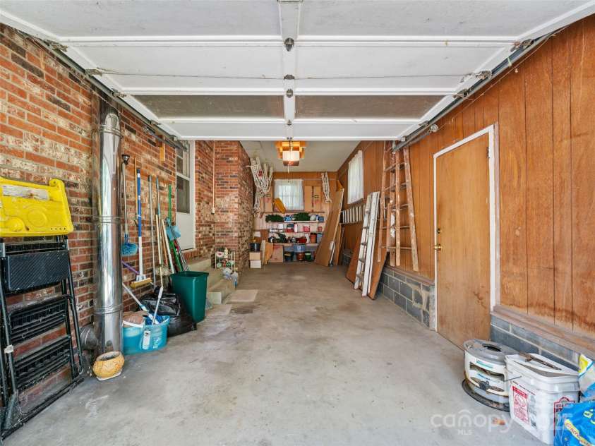 631 Macedonia Road, Asheville, NC 28804.  MLS# CAR4301225, YatesRealty ID 8894. Garage on main level