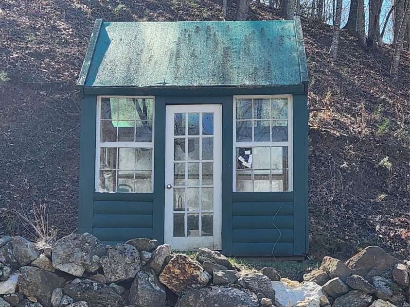 188 Paul Hurst Road, Franklin, NC 28734.  MLS# CAR4233199, YatesRealty ID 8897. Green house