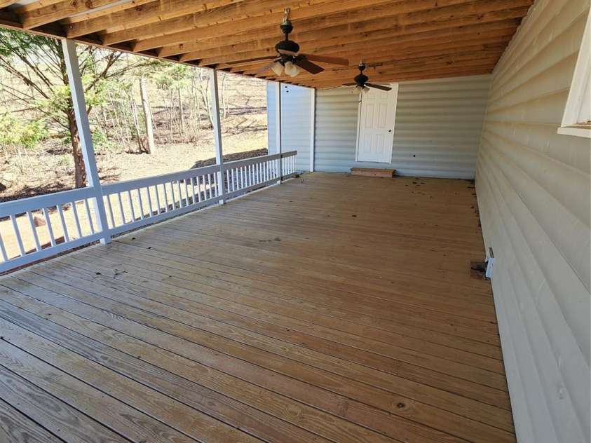 188 Paul Hurst Road, Franklin, NC 28734.  MLS# CAR4233199, YatesRealty ID 8897. Huge shaded side porch