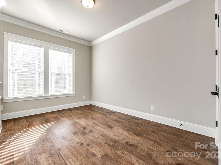 1891 Felts Parkway, Fort Mill, SC 29715.  MLS# CAR4237459, YatesRealty ID 8899. Main levelGuest suite pic-1