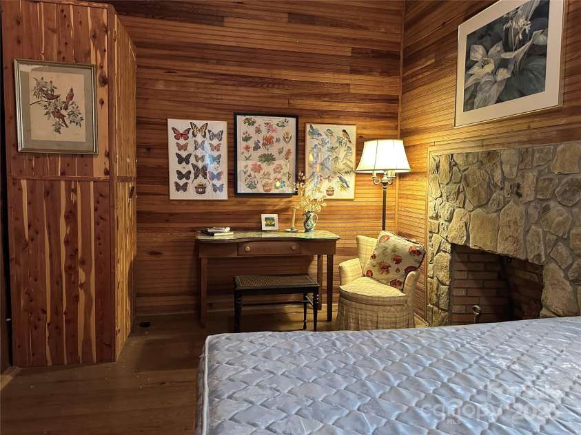 16 Osborn Knob Road, Little Switzerland, NC 28749.  MLS# CAR4307490, YatesRealty ID 89. Primary Bed w/Fire