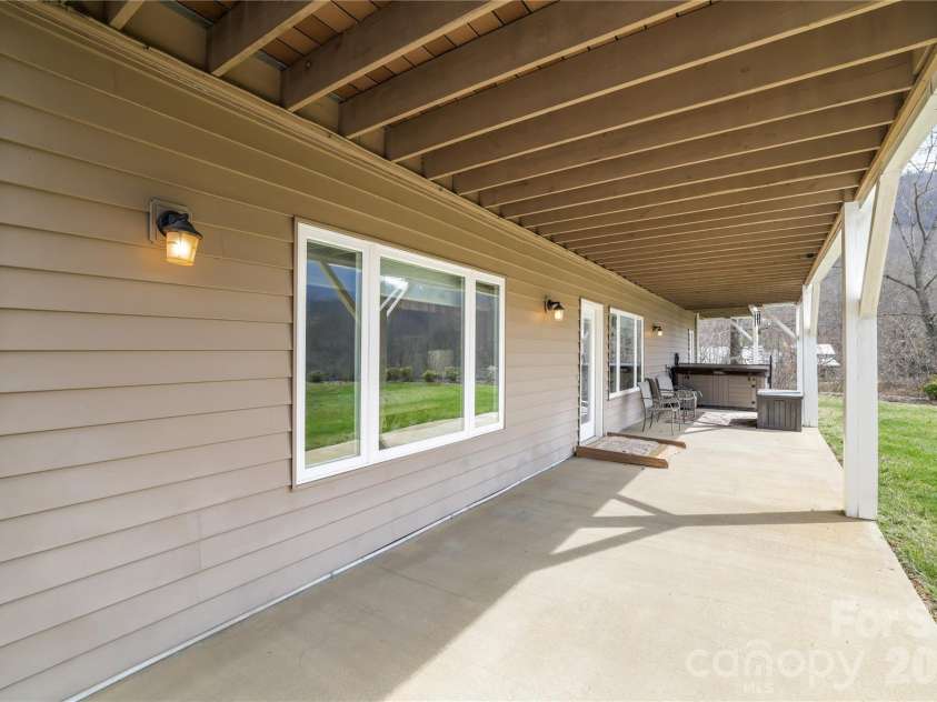 140 Debbie Loop, Waynesville, NC 28786.  MLS# CAR4298832, YatesRealty ID 8900. Walkout Basement Patio