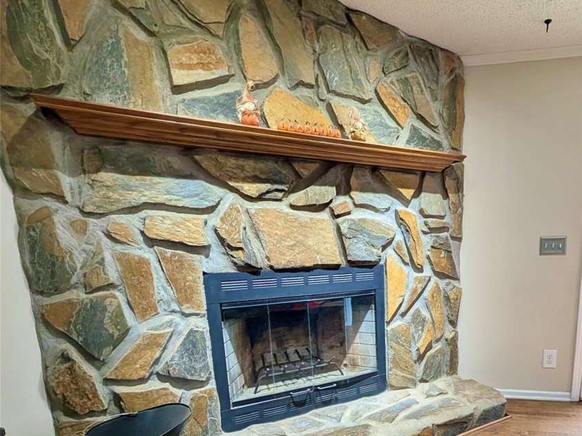 2357 Pleasant Hill Church Road, Grover, NC 28073.  MLS# CAR4314841, YatesRealty ID 8900. STONE WALL WOOD BURNING FIREPLACE