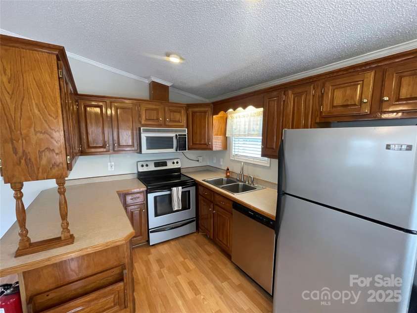 116 Dove Lane, New London, NC 28127.  MLS# CAR4249936, YatesRealty ID 8908. 