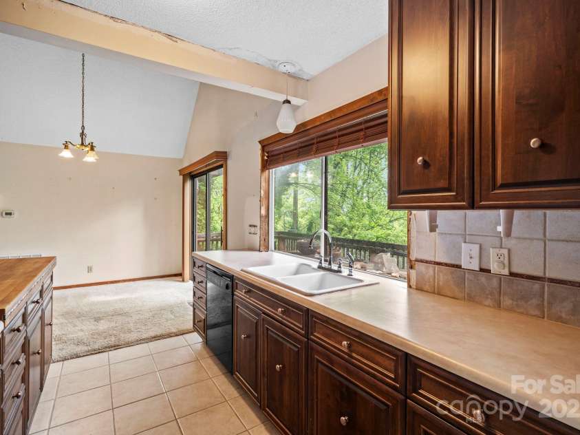 1020 Vineyard Road, Tryon, NC 28782.  MLS# CAR4252534, YatesRealty ID 8918. 