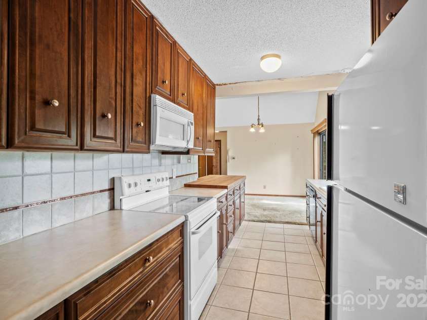 1020 Vineyard Road, Tryon, NC 28782.  MLS# CAR4252534, YatesRealty ID 8918. 