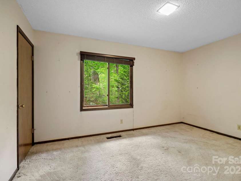 1020 Vineyard Road, Tryon, NC 28782.  MLS# CAR4252534, YatesRealty ID 8918. 