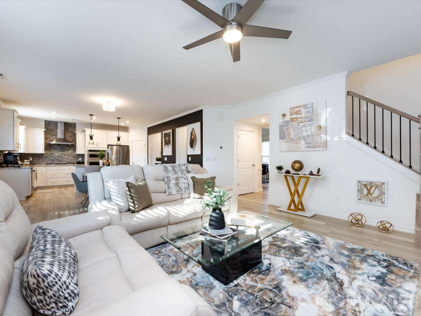 8903 Ansley Park Place, Huntersville, NC 28078.  MLS# CAR4366272, YatesRealty ID 8920. Bright and inviting great room featuring a cozy fireplace, abundant natural light, and open layout ideal for everyday living and entertaining.